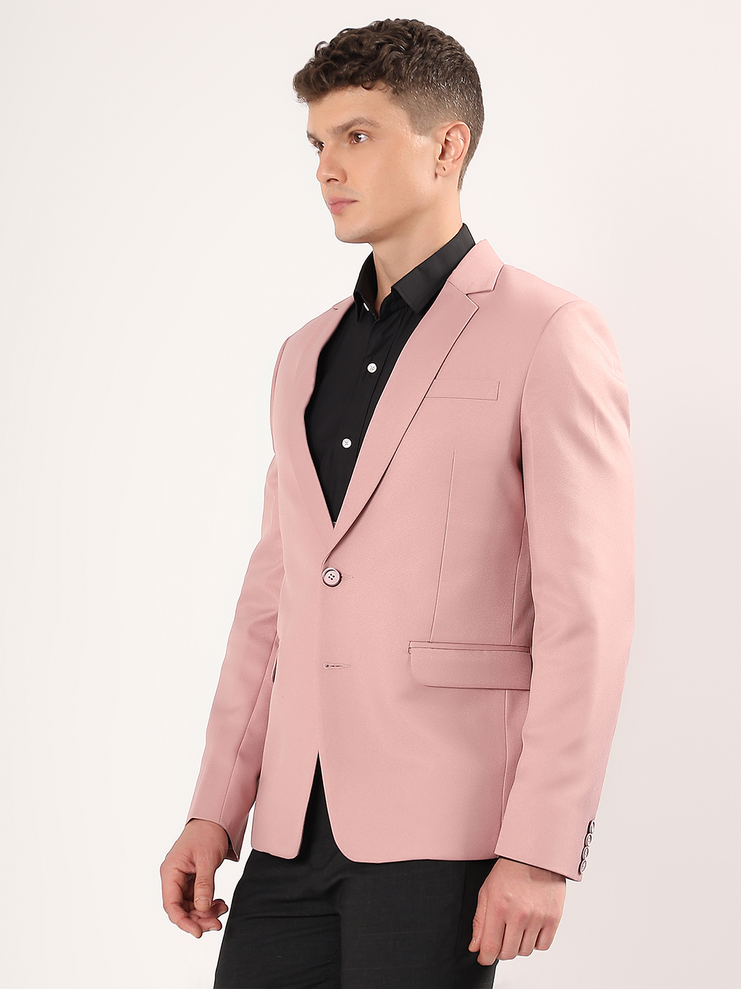 Refined tailoring and premium finish of pink blazer