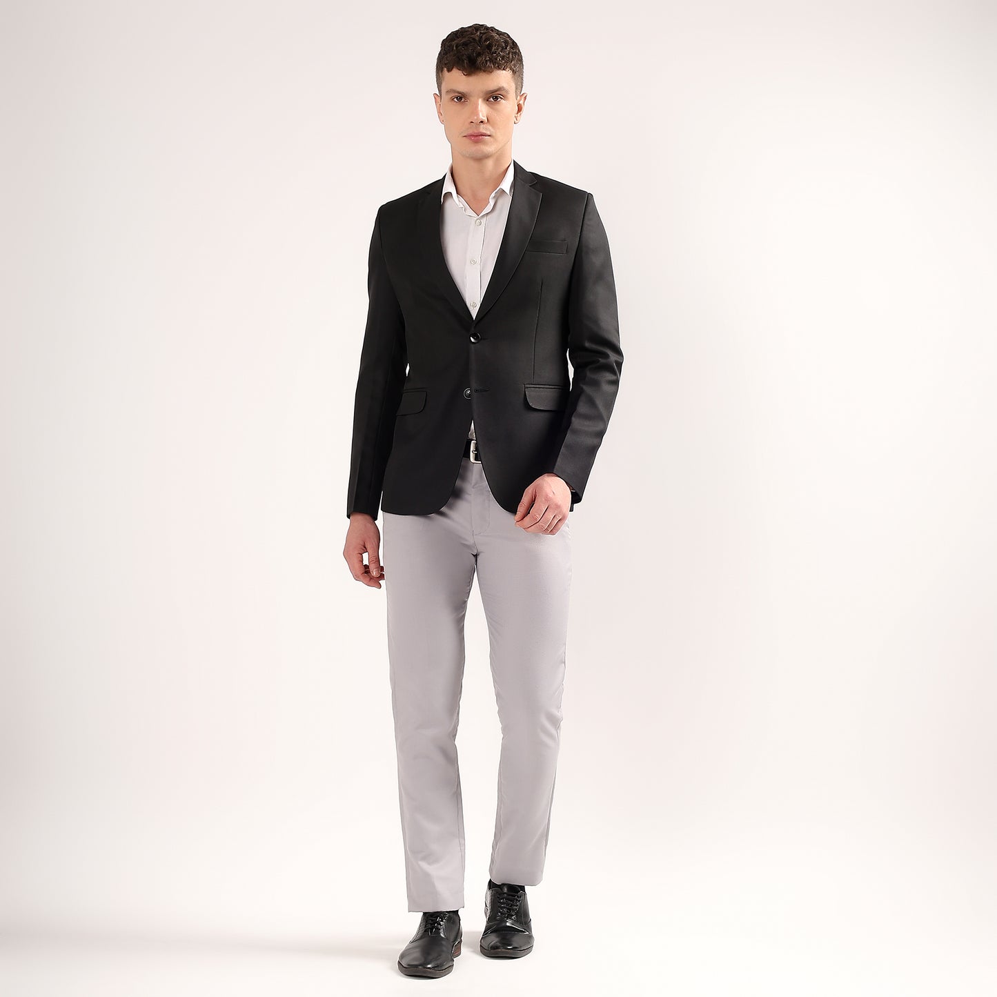 Close up of two button front on Darelooks black blazer sleek and timeless closure style