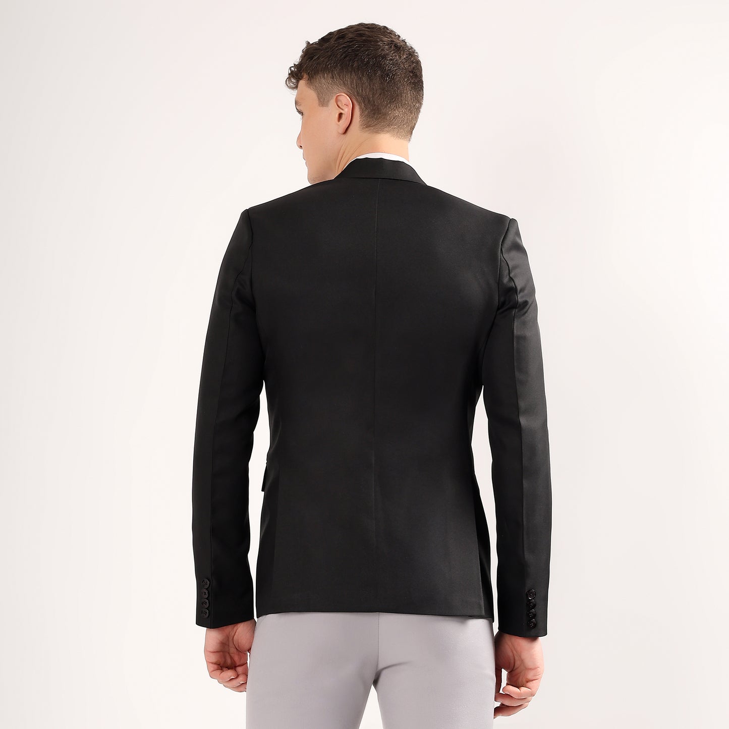 Smooth wrinkle resistant black polyester blend breathable fabric with a refined polished finish