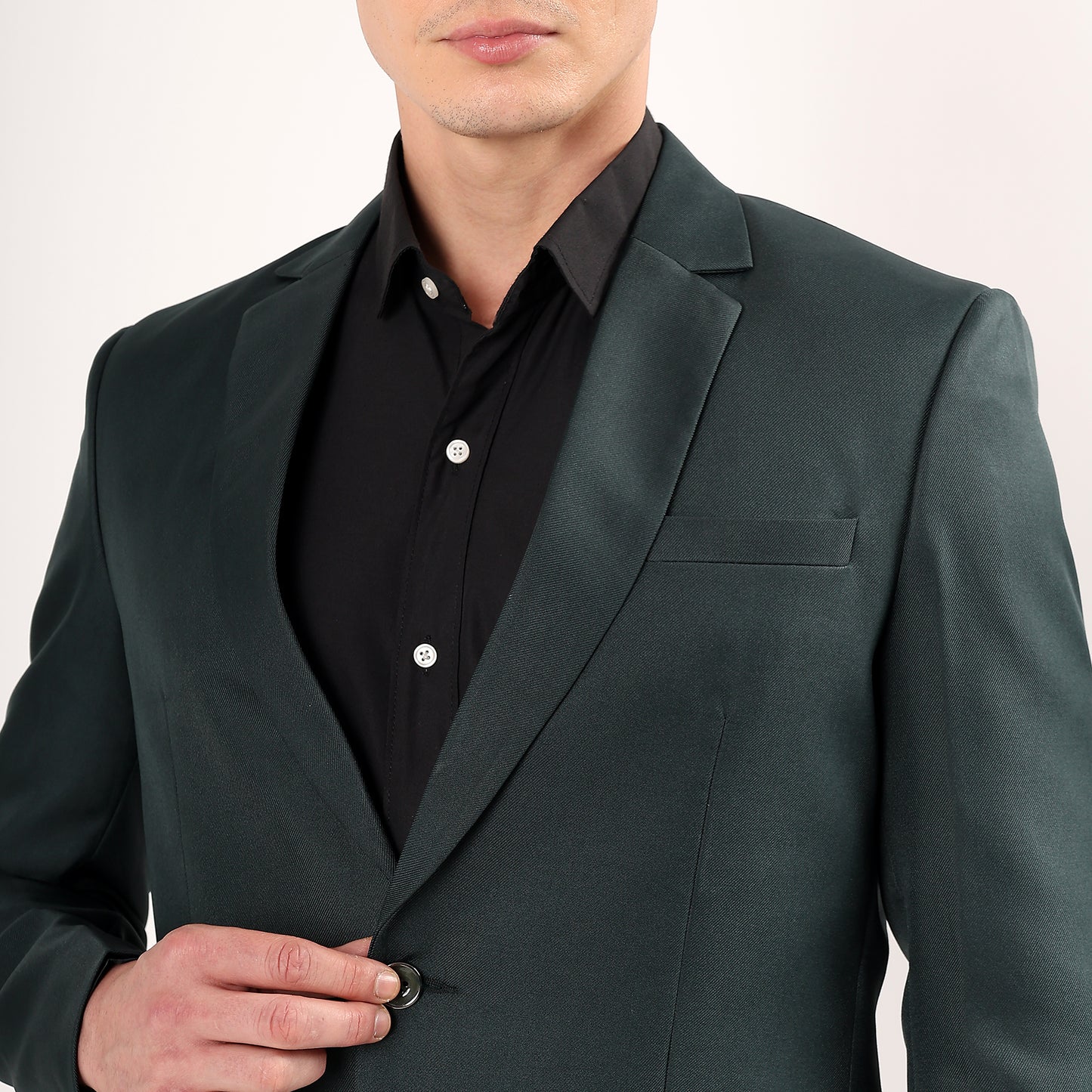 Model styled in Darelooks deep green blazer tailored for weddings festive events and elevated formal looks