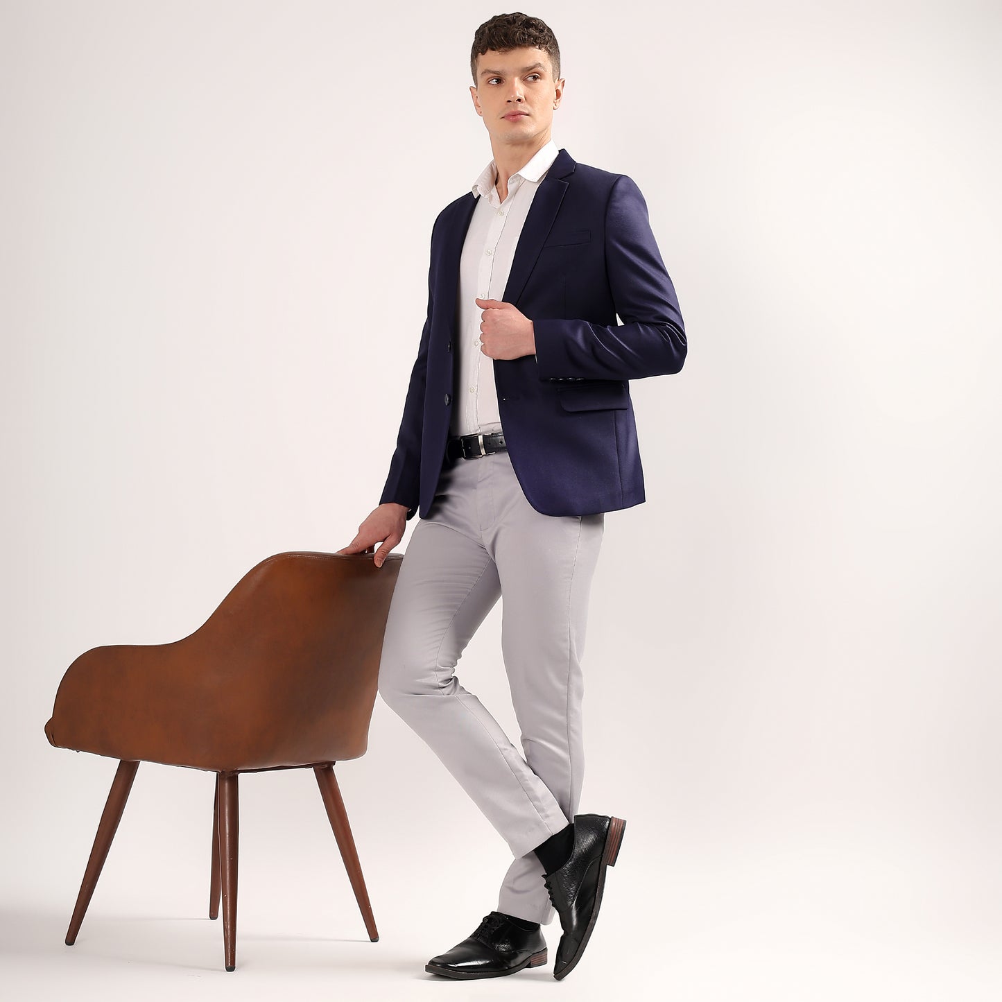 Side profile of Darelooks navy blue blazer showcasing double vents for easy movement and comfort