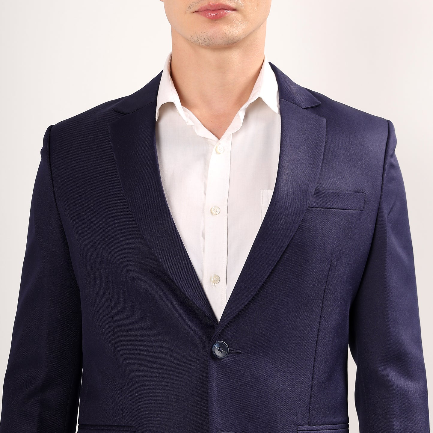 Model wearing Darelooks navy blue blazer tailored silhouette with elegant two-button closure