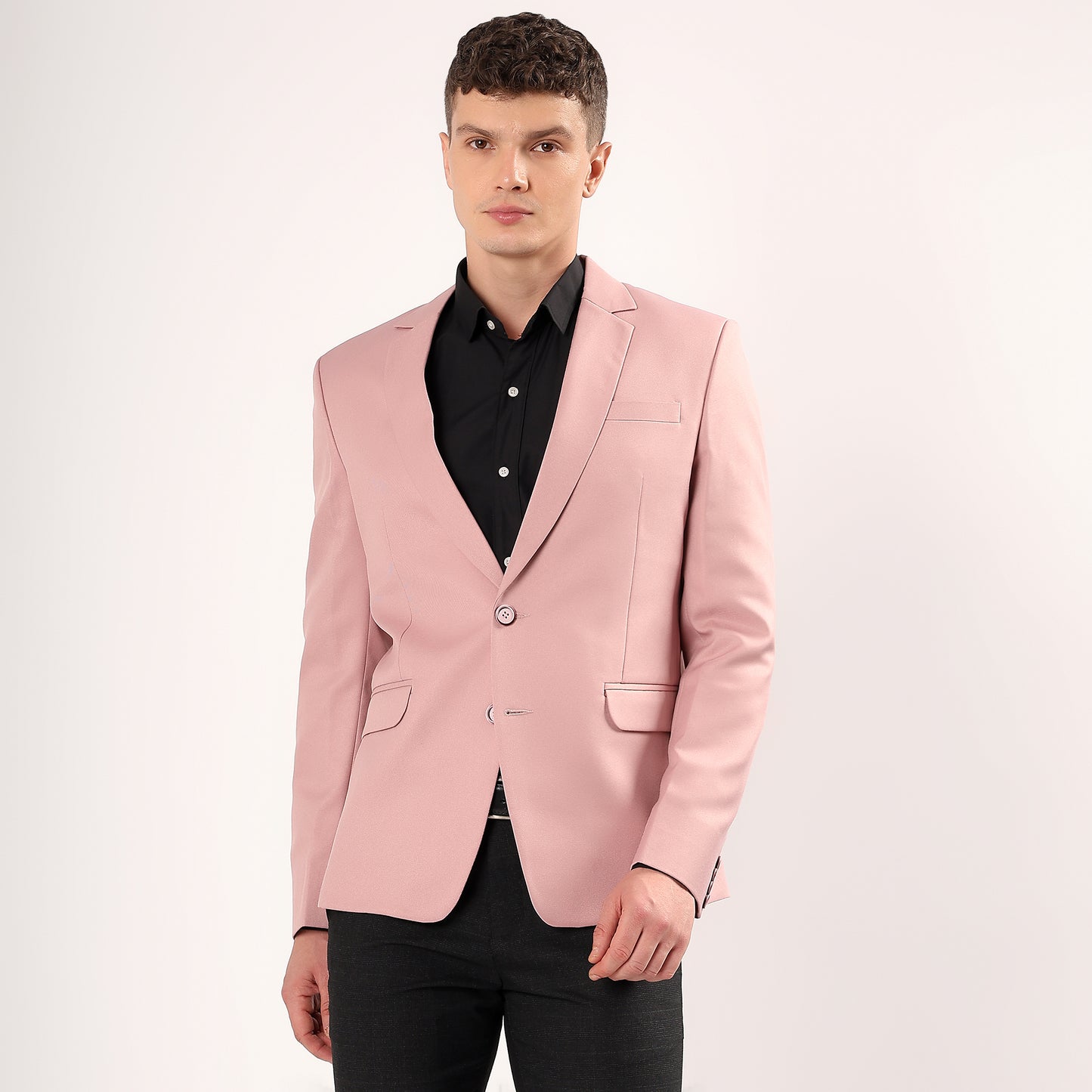 Model styled in Darelooks pastel pink blazer perfect modern fit look for summer weddings and parties