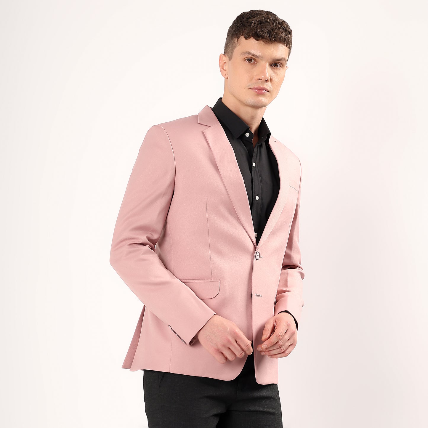 Close-up of Darelooks pastel pink blazer showcasing functional 5 pocket system and neat stitching