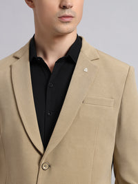 Detailed view of stretchable beige blazer fabric texture