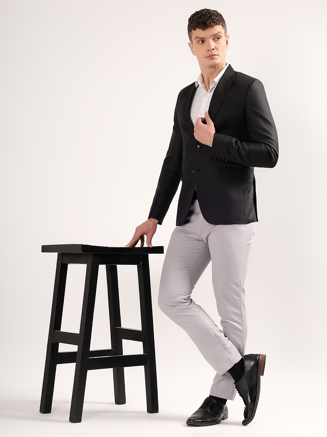 Modern elegant styling with black formal blazer