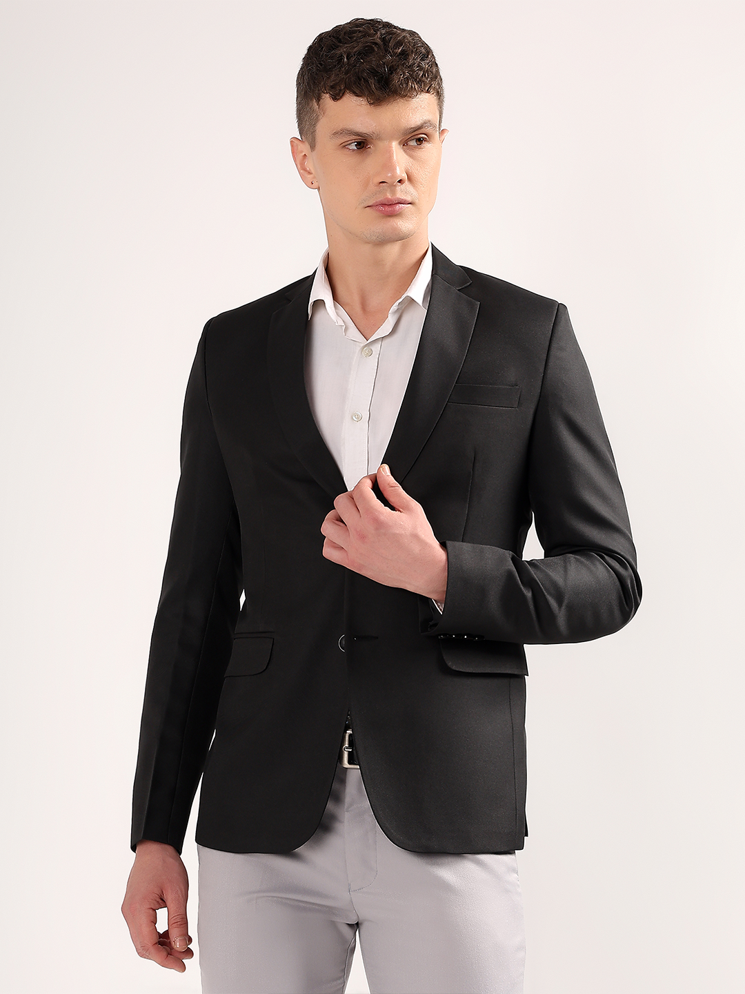 Men wearing black blazer styled for powerful formal look
