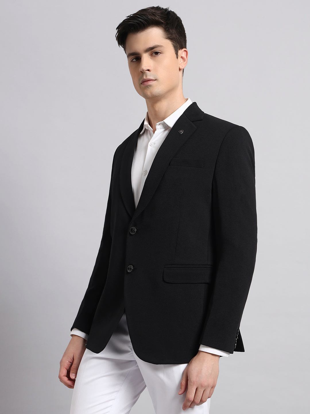 Fine detailing and premium stitching on black blazer