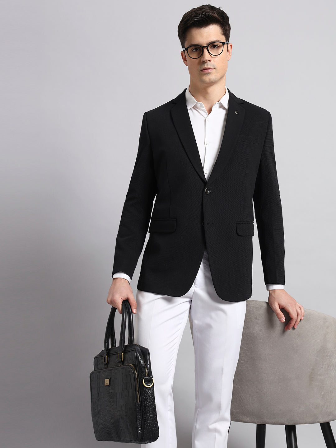 Signature fit black blazer in studio fashion shoot