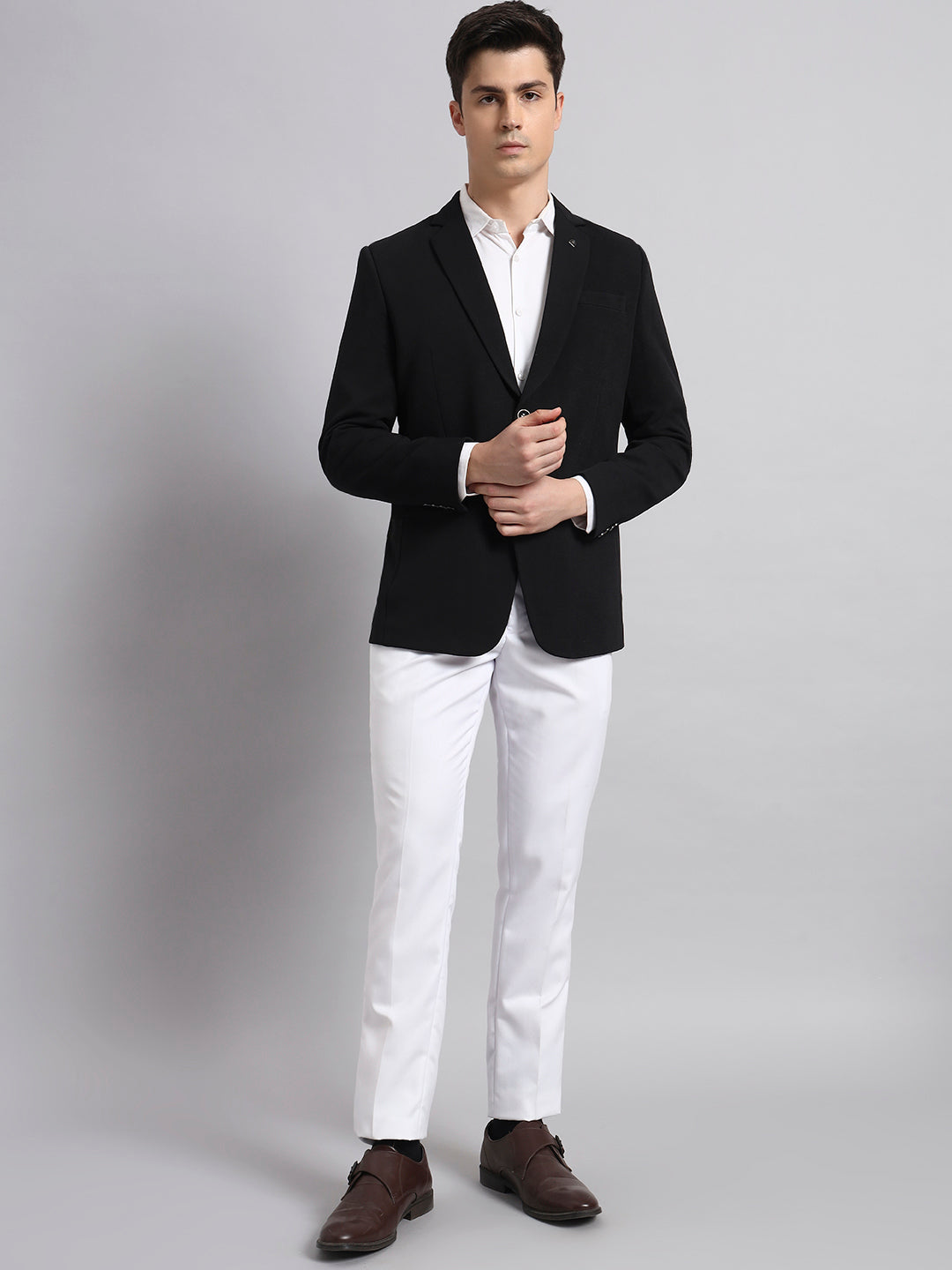 Statement outfit featuring black stretch blazer