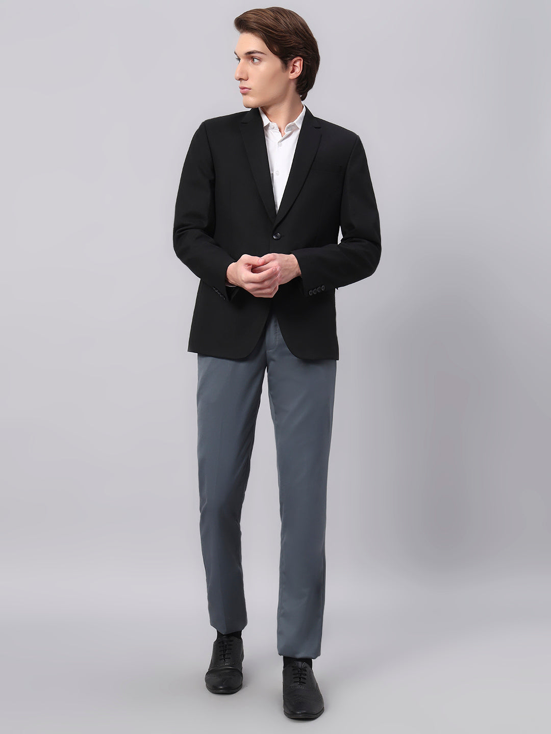 Refined tailoring and premium finish of black blazer