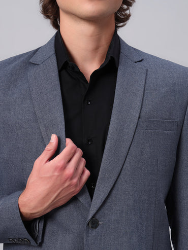 Close view of smooth viscose fabric in blue blazer