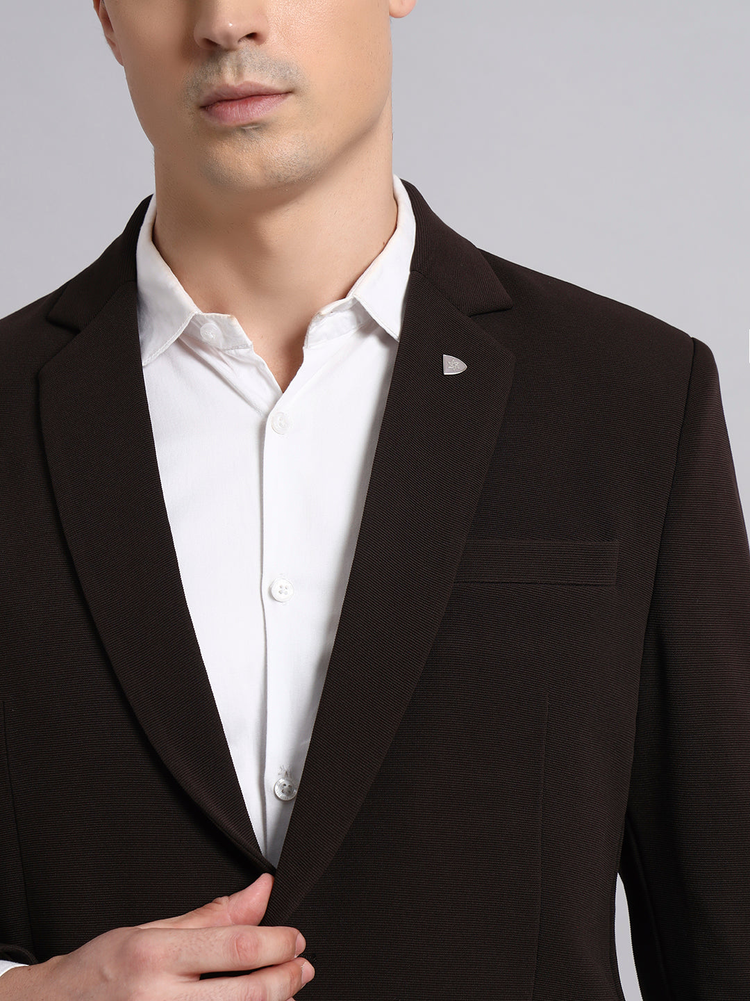 Close look at soft and stretchable brown blazer fabric