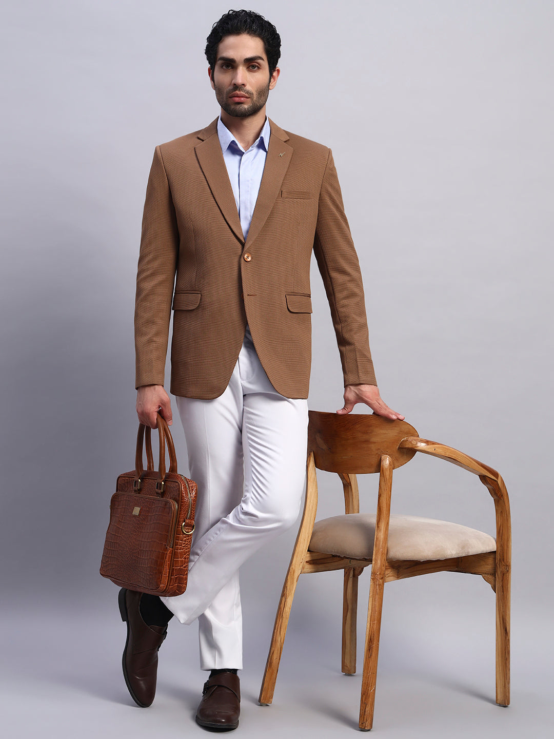 Brown stretchable blazer designed for flexible all day comfort