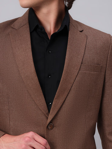 Close view of smooth viscose fabric in brown blazer