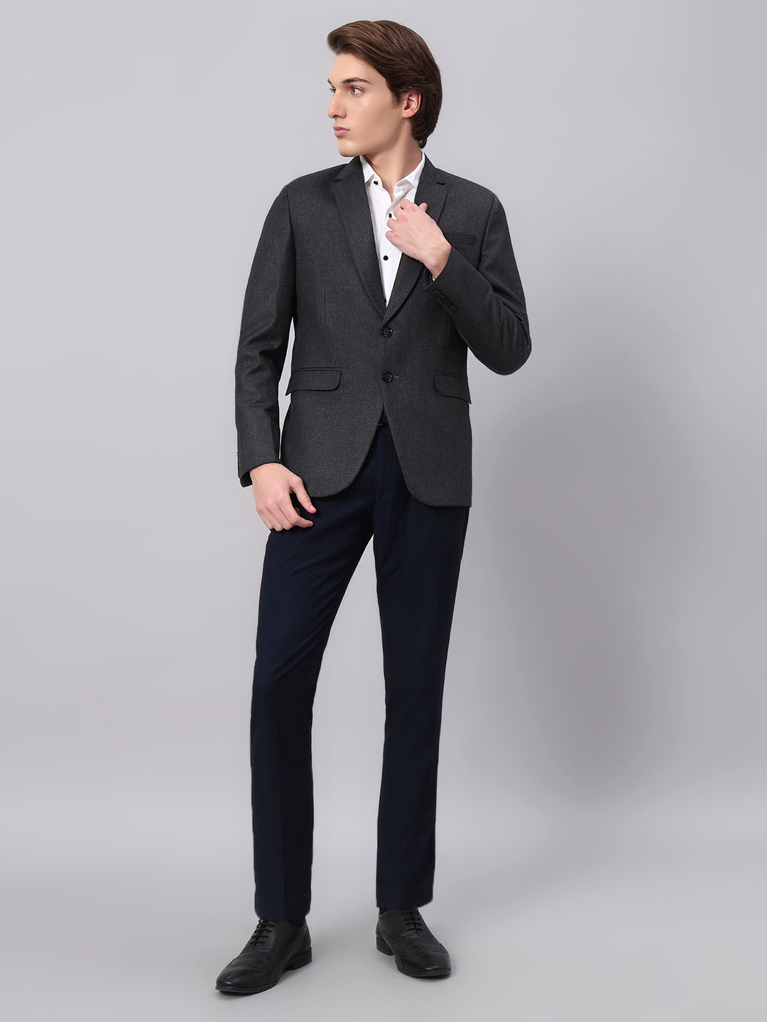 Precision tailoring and premium finish of charcoal blazer