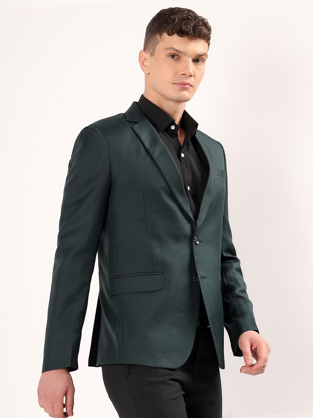Rich color green blazer perfect for evening wear