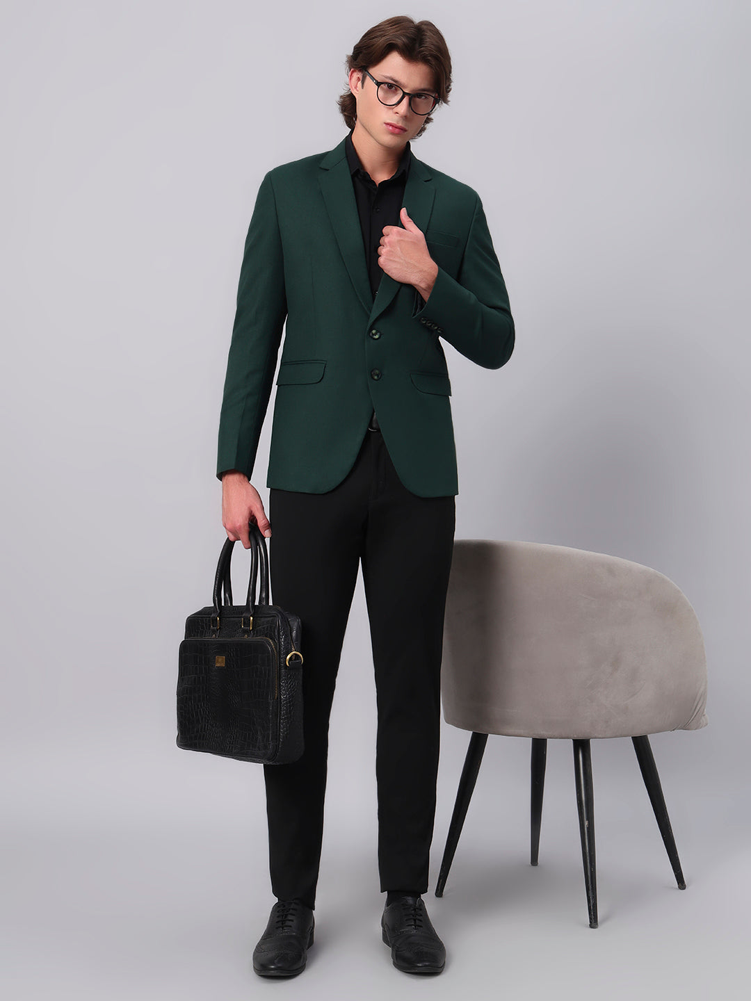 Modern elegant outfit featuring green blazer for men