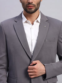 Close up of advanced stretch fabric in grey blazer