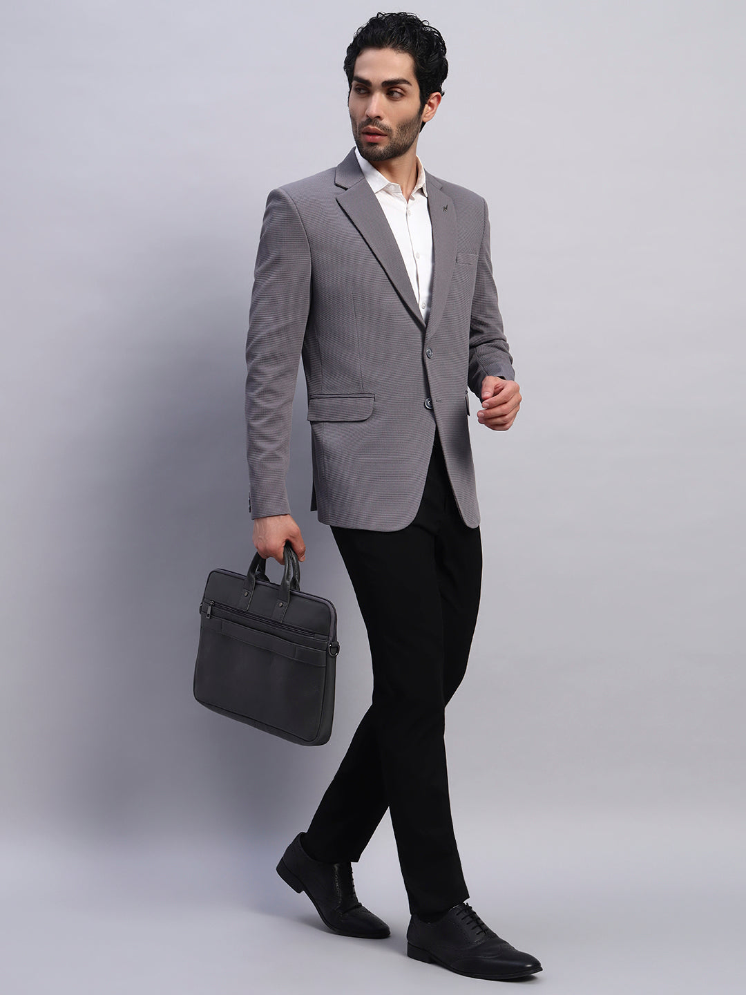 Grey stretchable blazer built for flexible everyday comfort
