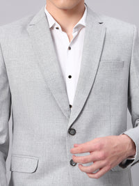 Close view of smooth viscose fabric in light grey blazer