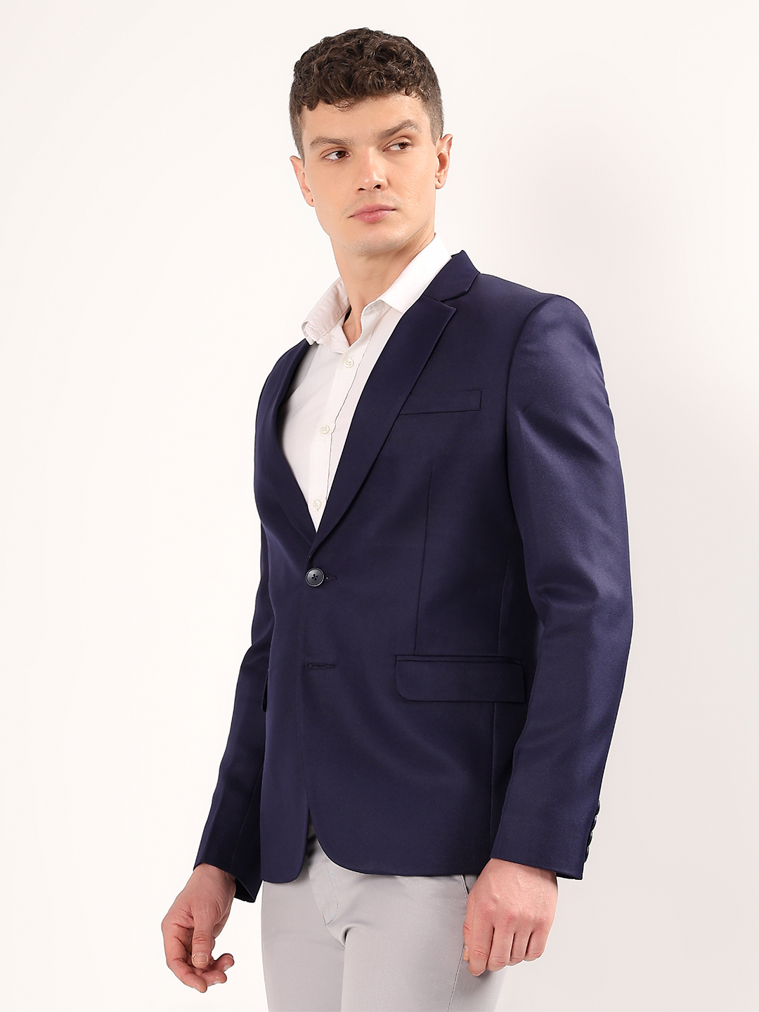 Refined tailoring and premium finish of navy blazer