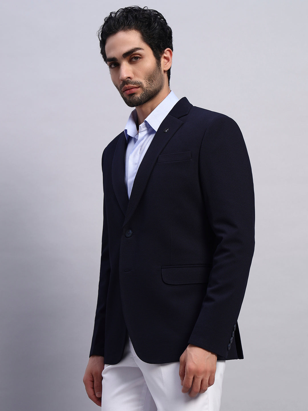 Classic navy blue stretchable blazer styled for professional look