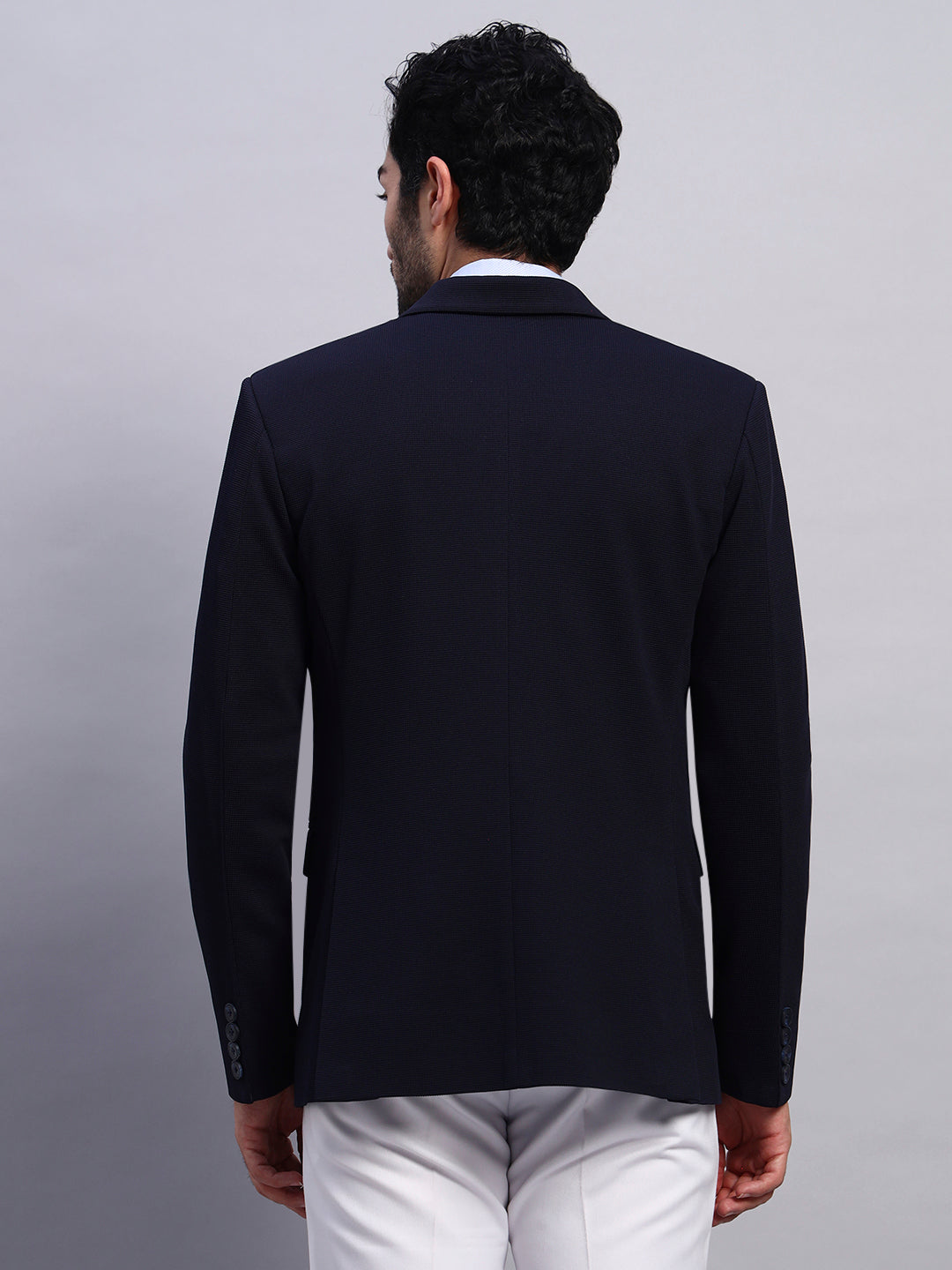 Modern professional outfit with navy blue stretch blazer