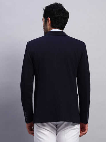 Modern professional outfit with navy blue stretch blazer