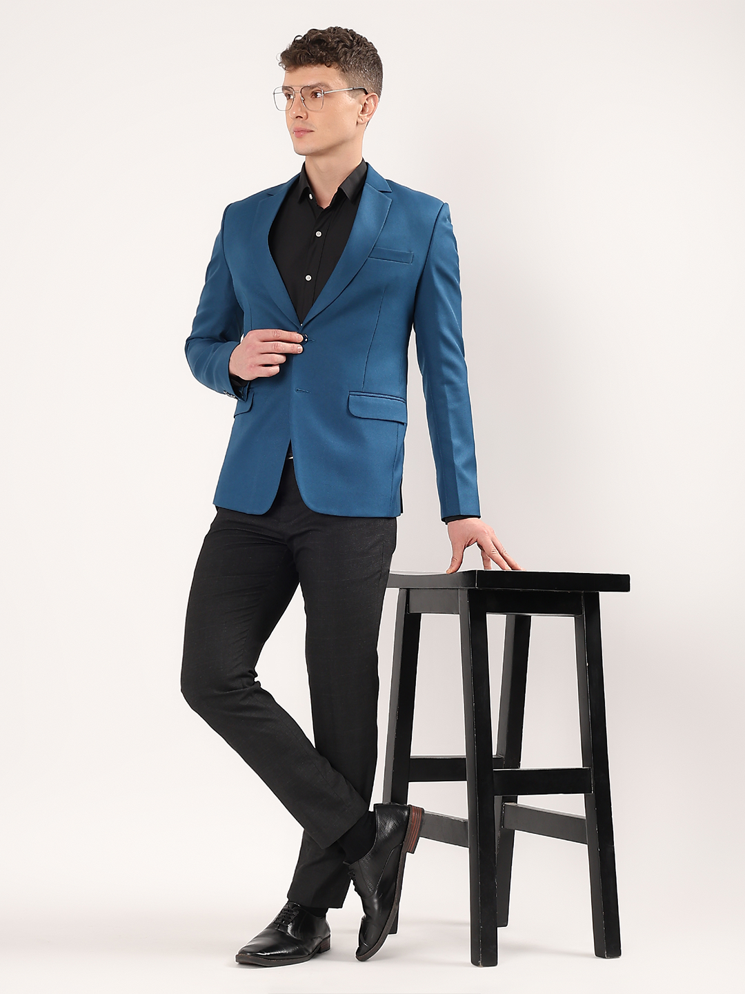 Modern occasion styling with peacock green blazer for men