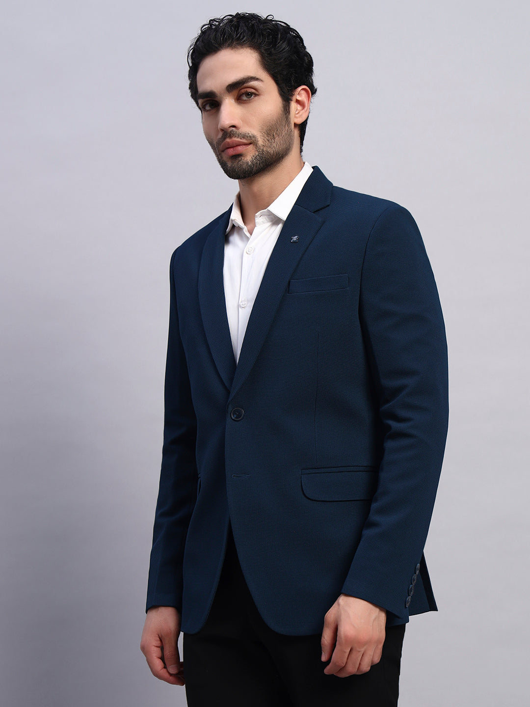 Comfortable movement friendly peacock green blazer
