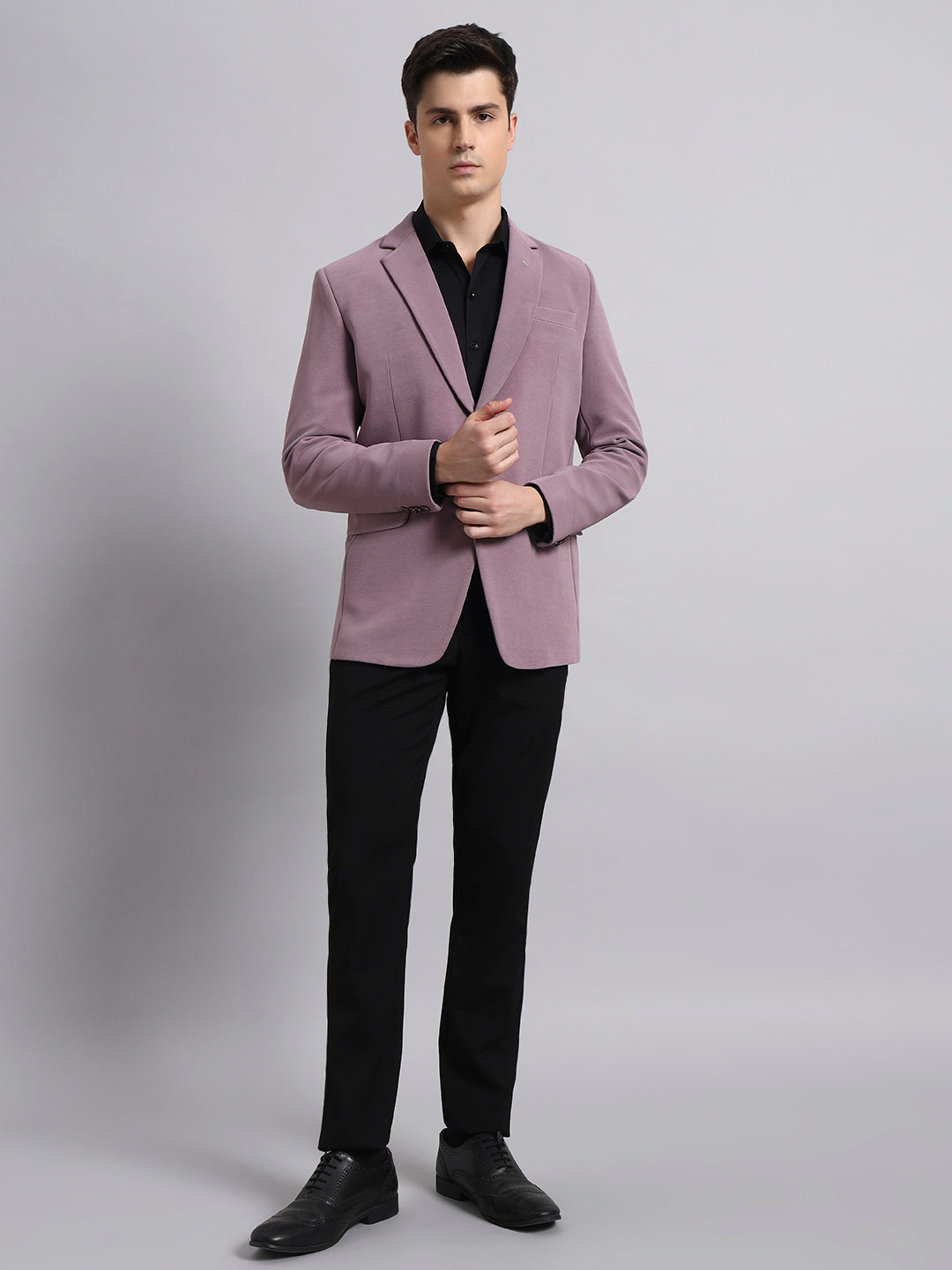 Premium stitching and finishing on pink stretch blazer
