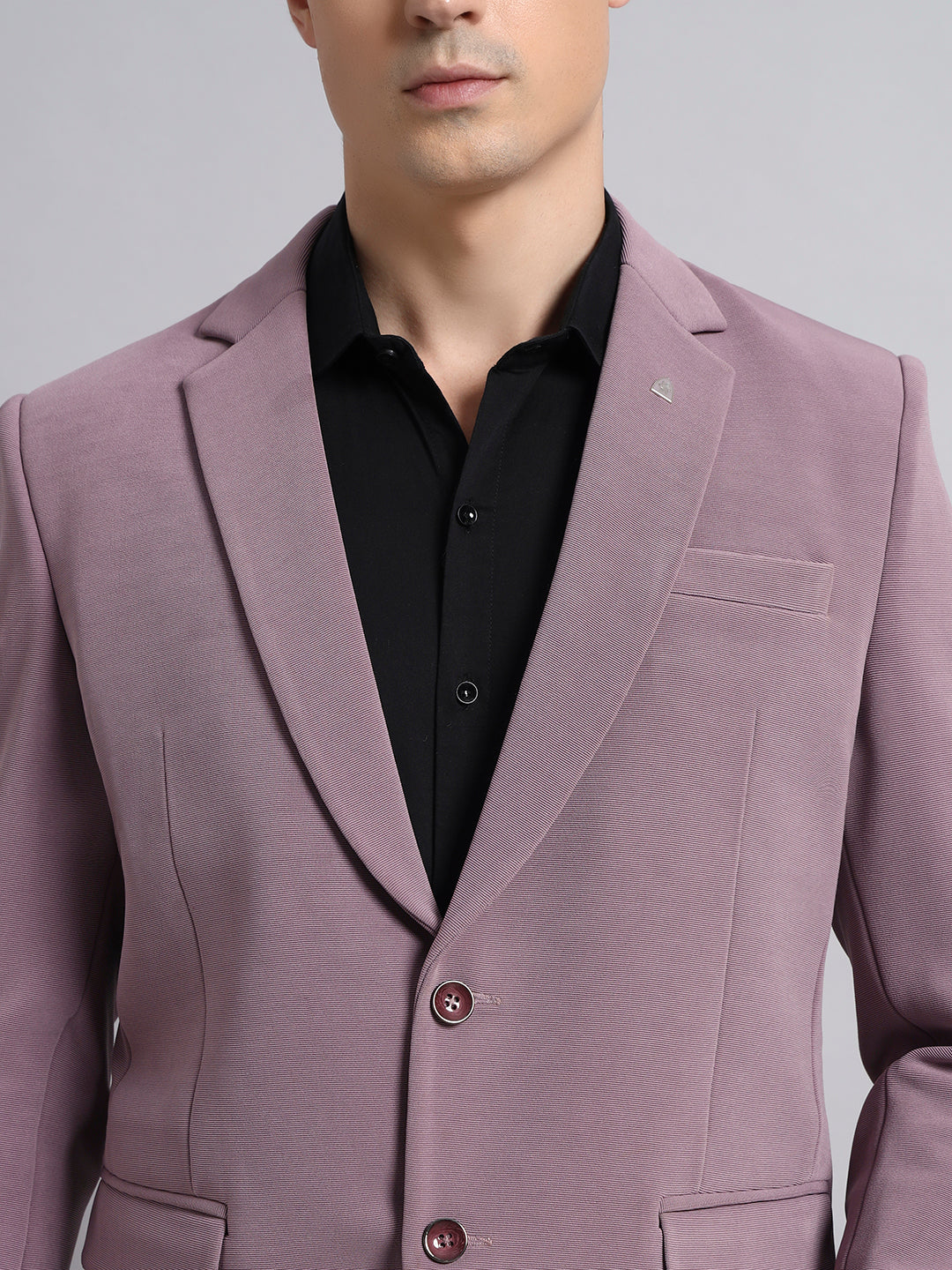 Close view of soft stretchable pink blazer fabric