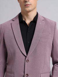 Close view of soft stretchable pink blazer fabric