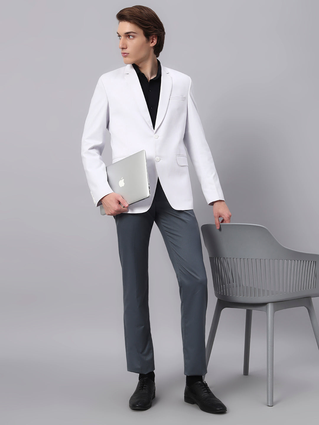 Close view of smooth viscose fabric in white blazer