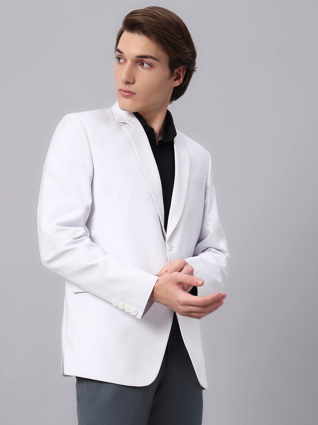 Premium finishing and stitching on white men’s blazer