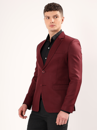 Refined tailoring and premium finish of wine blazer