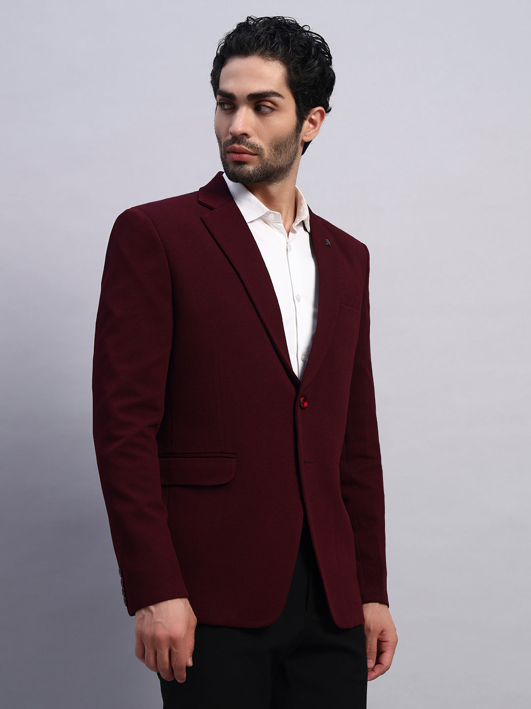 Rich wine color stretchable blazer styled for elegant look