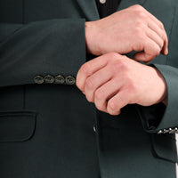 Folded Darelooks blazer in deep green elegant cut with rich tone and fine tailoring