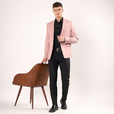 Model wearing Darelooks pastel pink blazer size 40 tailored silhouette for elegant summer styling