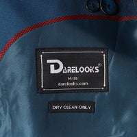 Notch lapel close up of Darelooks peacock green blazer sleek tailoring in bold formalwear