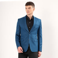 Model styled in Darelooks peacock green blazer tailored modern cut with rich color and two-button closure