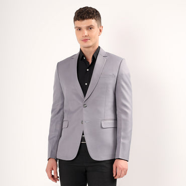 Model wearing Darelooks Spanish grey blazer tailored for a refined structured silhouette
